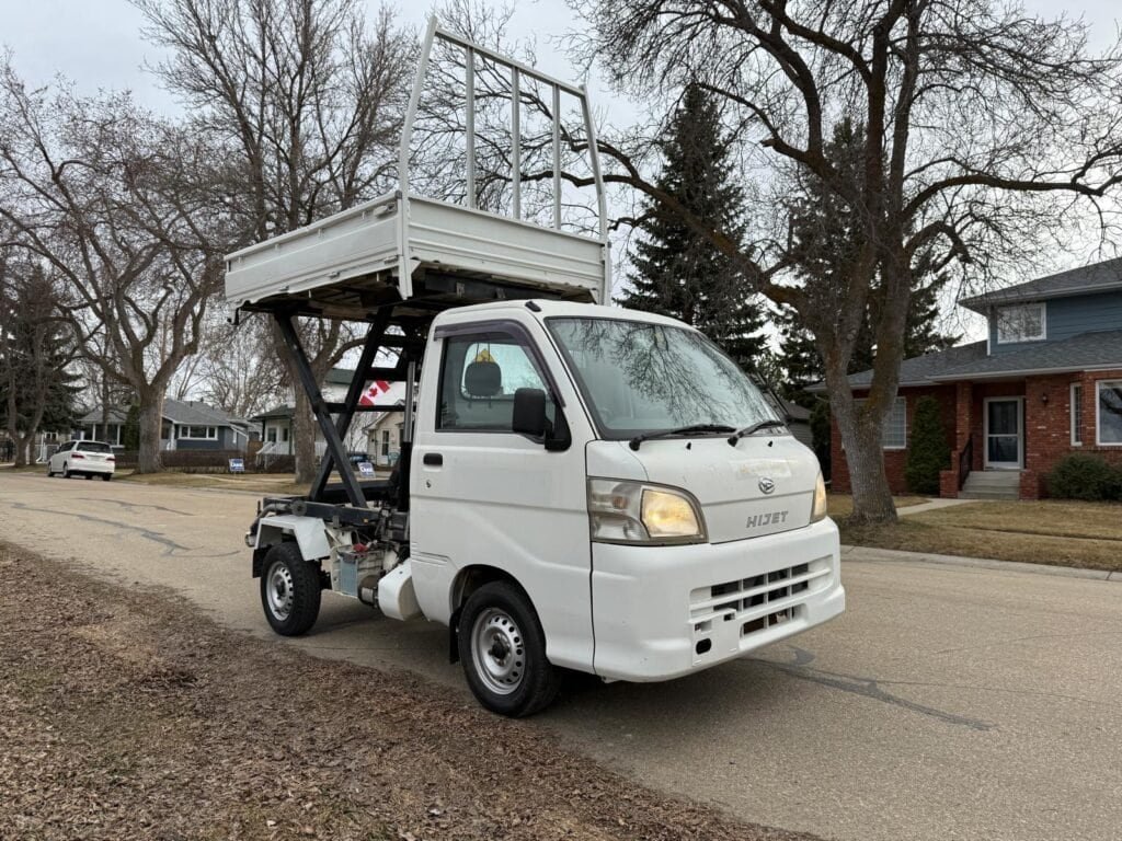 Japan canada motors | 2009 daihatsu hijet scissor-lift & dump 4wd #126