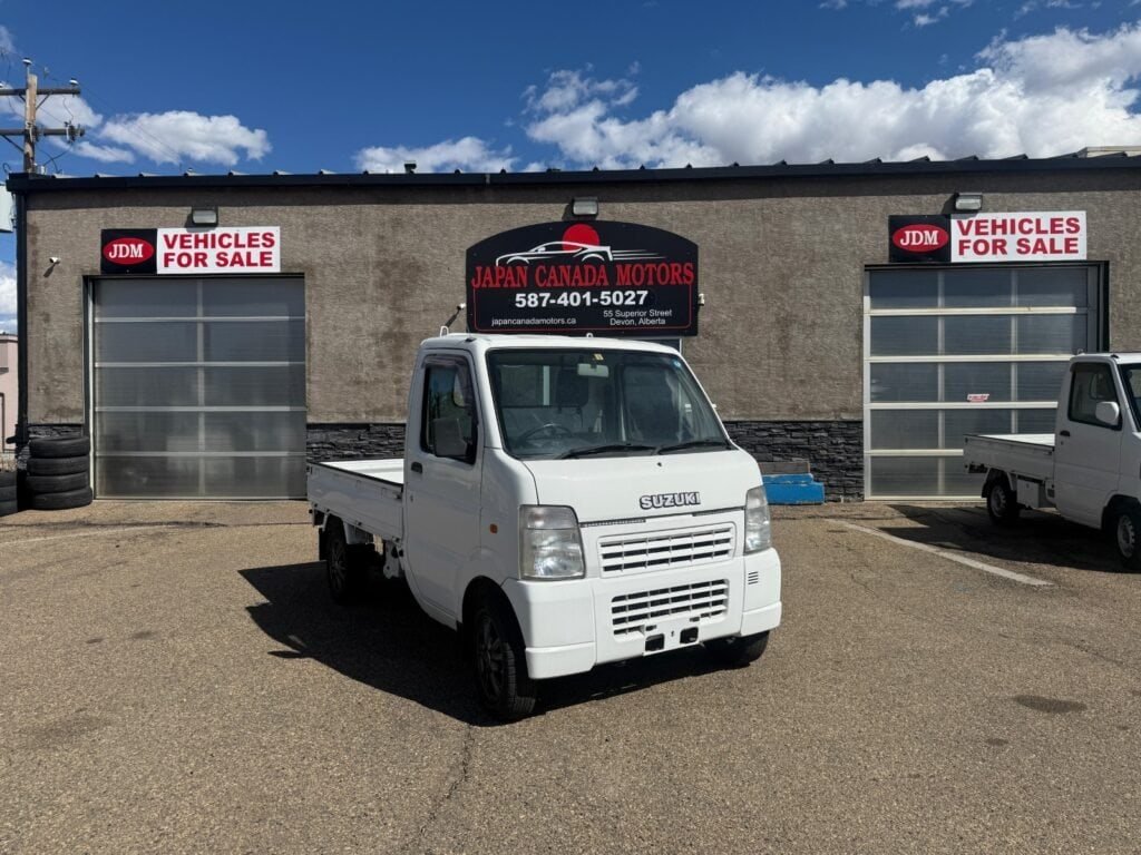 Front exterior view of a 2008 Suzuki Carry 4WD for sale at Japan Canada Motors, 55 Superior Street, Devon, Alberta. Call 587-401-5027.